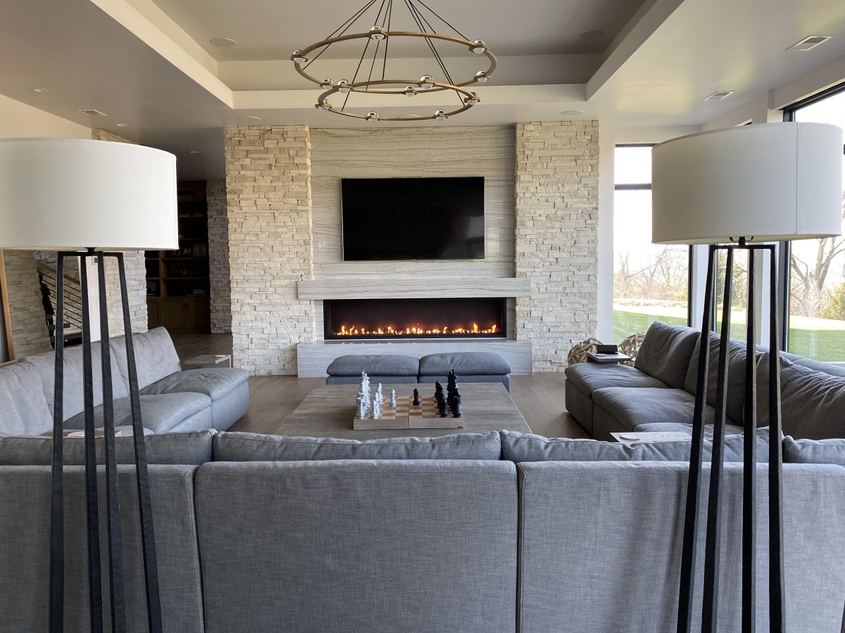 Mounting a TV Above a Fireplace: The Heated Debate - Acucraft Fireplaces