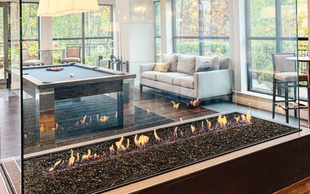 four-sided-glass-fireplace-in-apartment-billiard-room-and-lounge