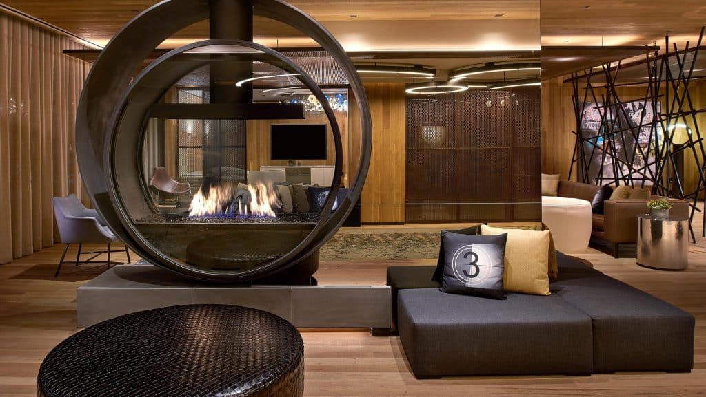 A custom circular fireplace creating a bold statement in a modern home.