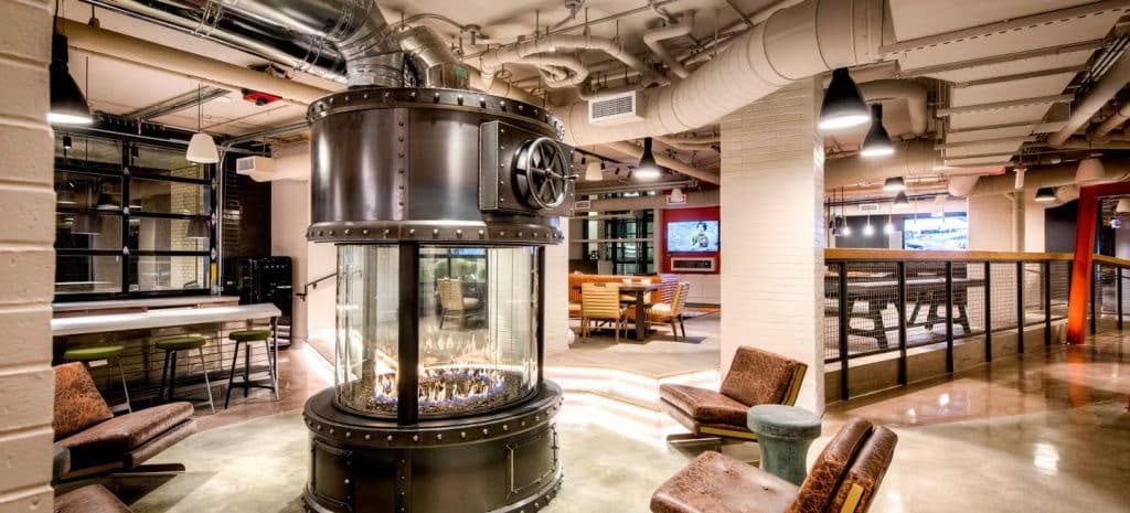 Acucraft's custom circular fireplace made for AVA NoMa