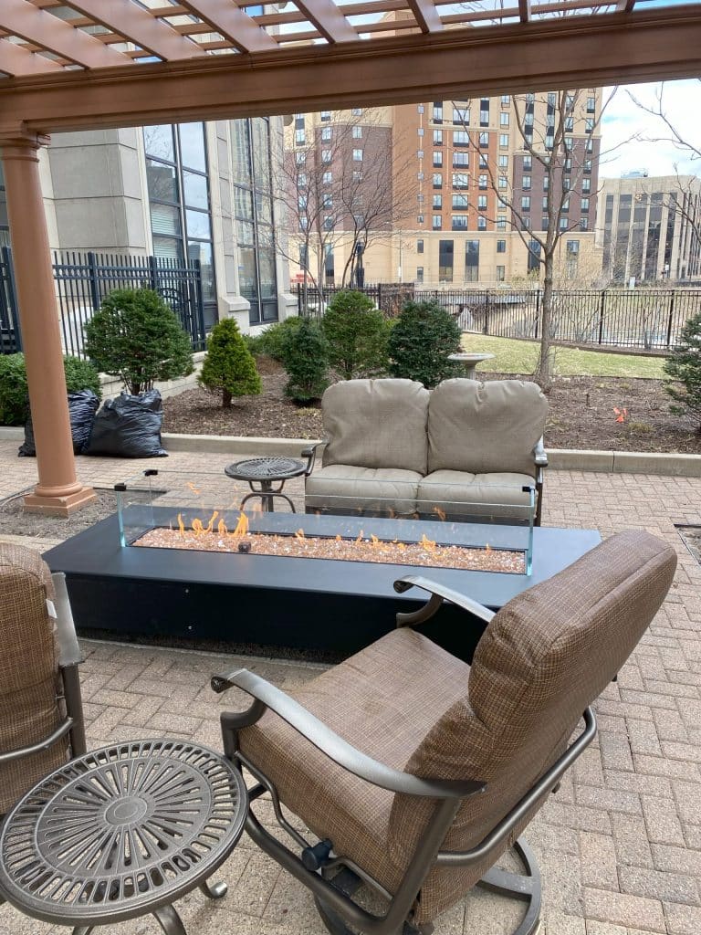 Acucraft Custom Outdoor Gas Fire Table with Windscreen & Glass Media (5) Acucraft custom outdoor gas fire table with windscreen and glass media, exemplifying superior craftsmanship, innovation, and luxury—making Acucraft the best choice for outdoor fireplaces.
