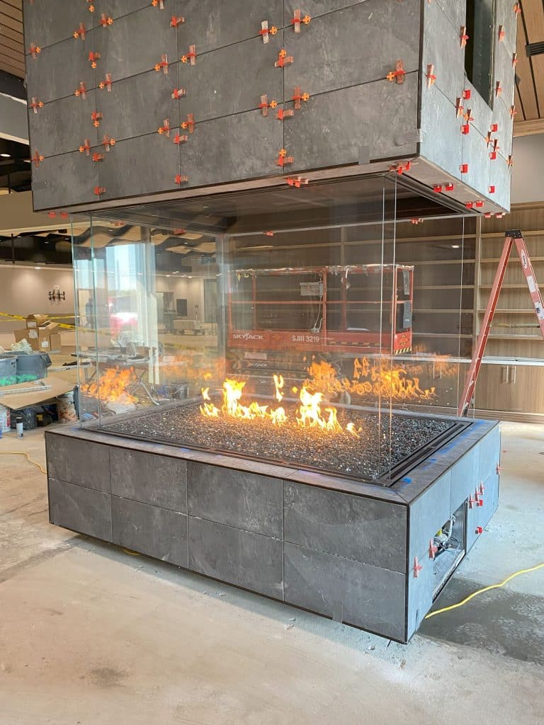 Acucraft Custom Four Sided Glass Fireplace with Glass Media during Install (3)