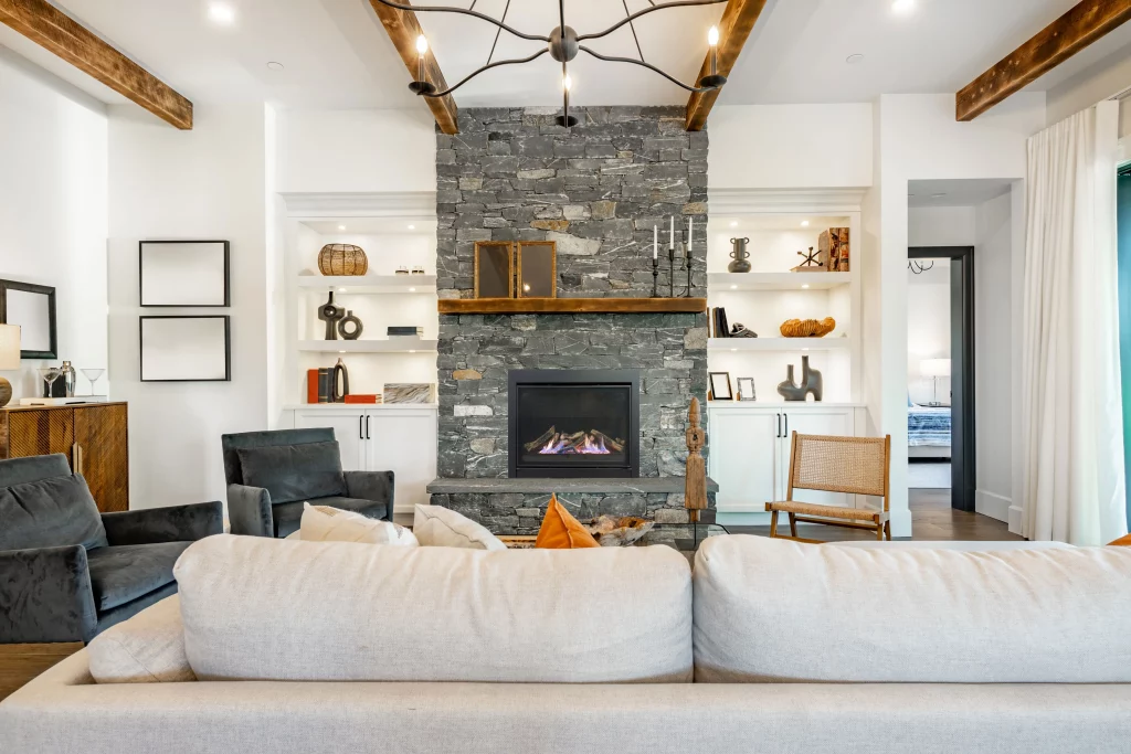 shabby chic living room with stone direct vent gas fireplace with logs